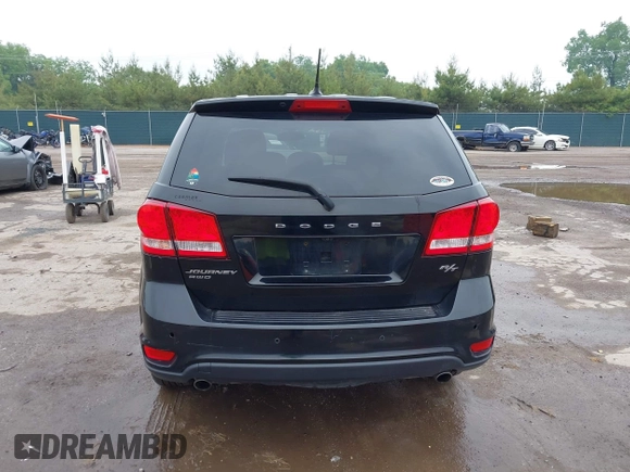 2015 Dodge Journey R/T with VIN 3C4PDDEG1FT554904, listed as a IAAI auction lot 42415888 with 143,039 mi miles and . Bid and sale history available at DreamBid. Image 16.