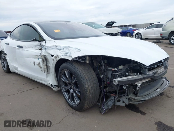 2021 Tesla Model S Long Range with VIN 5YJSA1E57MF453815, listed as a IAAI auction lot 41818700 with 51,176 mi miles and . Bid and sale history available at DreamBid. Image 6.