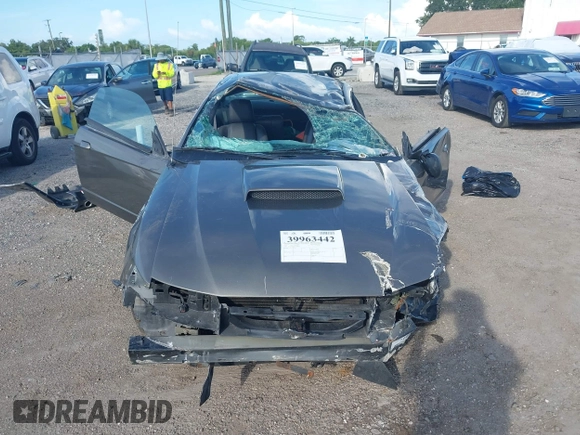 2004 Ford Mustang Standard z VIN 1FAFP40684F194867, wystawiony jako IAAI lot #39963442 z przebiegiem Nie podano mil oraz . Historia ofert i sprzedaży dostępna na DreamBid. Obrazek 12.
