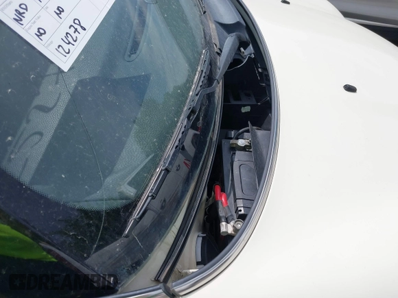 2012 MINI Convertible with VIN WMWZN3C51CT134646, listed as a IAAI auction lot 42252740 with 124,278 mi miles and . Bid and sale history available at DreamBid. Image 14.