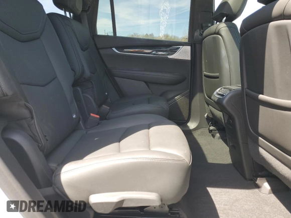 2023 Cadillac XT6 AWD Premium Luxury с VIN 1GYKPDRS7PZ130700, выставлен на аукционе Copart как лот 54295525 с пробегом 16 441 миль миль и Списание • Salvage title. История ставок и продаж доступна на DreamBid. Изображение 11.