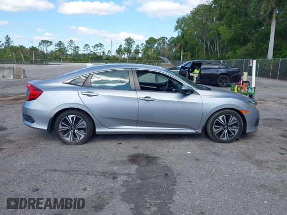 2017 Honda Civic EX-T with VIN 19XFC1F39HE001756, listed as a IAAI auction lot 42030331 with 44,056 mi miles. Bid and sale history available at carsss.com. Image 13.