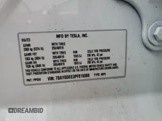 2023 Tesla Model Y Long Range z VIN 7SAYGDEE3PF815088, wystawiony jako Copart lot #54849895 z przebiegiem 19 637 mil mil oraz Szkoda całkowita • Salvage title. Historia ofert i sprzedaży dostępna na DreamBid. Obrazek 13.