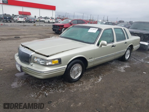 1997 Lincoln Town Car Signature z VIN 1LNLM82W8VY759792, wystawiony jako IAAI lot #41730026 z przebiegiem 60 198 mil mil oraz . Historia ofert i sprzedaży dostępna na DreamBid. Obrazek 19.