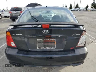 2005 Hyundai Accent GLS z VIN KMHCG35C35U364132, wystawiony jako Copart lot #47227385 z przebiegiem 177 143 mil mil oraz Szkoda całkowita • Salvage title. Historia ofert i sprzedaży dostępna na DreamBid. Obrazek 6.