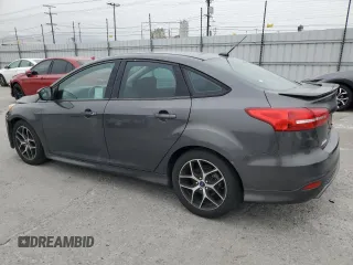 2016 Ford Focus SE z VIN 1FADP3F23GL405565, wystawiony jako Copart lot #60173935 z przebiegiem 82 167 mil mil oraz Szkoda całkowita • Salvage title. Historia ofert i sprzedaży dostępna na DreamBid. Obrazek 2.