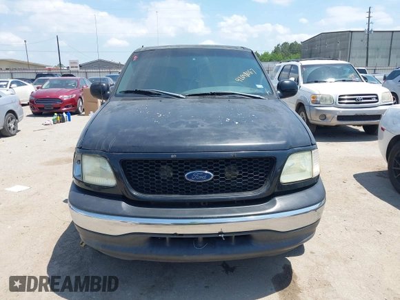 2002 Ford F-150 XLT with VIN 1FTRW07602KD37873, listed as a IAAI auction lot 42048067 with 1 mi miles. Bid and sale history available at carsss.com. Image 6.