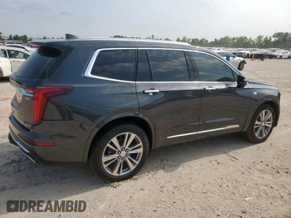 2022 Cadillac XT6 Premium Luxury z VIN 1GYKPCRS1NZ104567, wystawiony jako Copart lot #58211505 z przebiegiem 54 541 mil mil oraz Tytuł czysty. Historia ofert i sprzedaży dostępna na DreamBid. Obrazek 3.