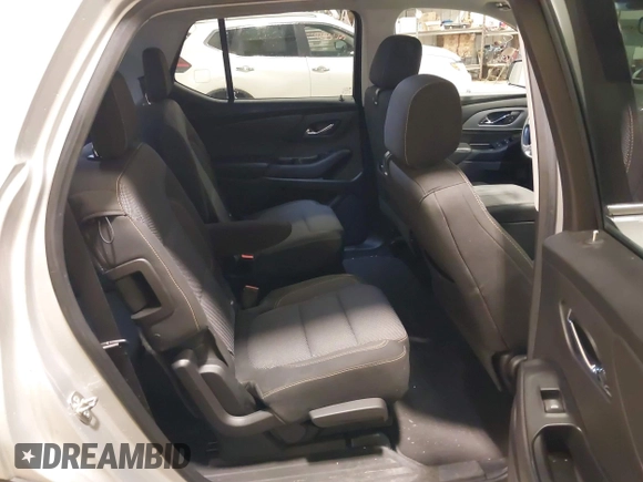 2018 Chevrolet Traverse LT Cloth z VIN 1GNEVGKW9JJ144070, wystawiony jako IAAI lot #42118002 z przebiegiem 142 006 mil mil oraz . Historia ofert i sprzedaży dostępna na DreamBid. Obrazek 8.