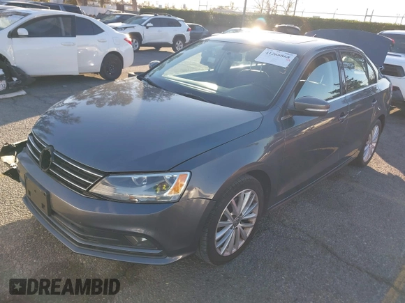 2015 Volkswagen Jetta Sport with VIN 3VWD17AJ2FM318669, listed as a IAAI auction lot 41266868 with 124,539 mi miles and . Bid and sale history available at DreamBid. Image 2.