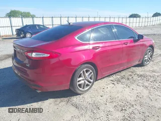 2014 Ford Fusion SE with VIN 3FA6P0HD8ER100227, listed as a IAAI auction lot 42192133 with 143,853 mi miles and . Bid and sale history available at DreamBid. Image 4.