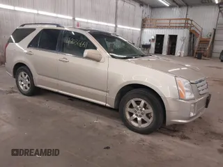 2008 Cadillac SRX RWD z VIN 1GYEE637680134567, wystawiony jako IAAI lot #42036641 z przebiegiem 160 958 mil mil oraz . Historia ofert i sprzedaży dostępna na DreamBid. Obrazek 1.