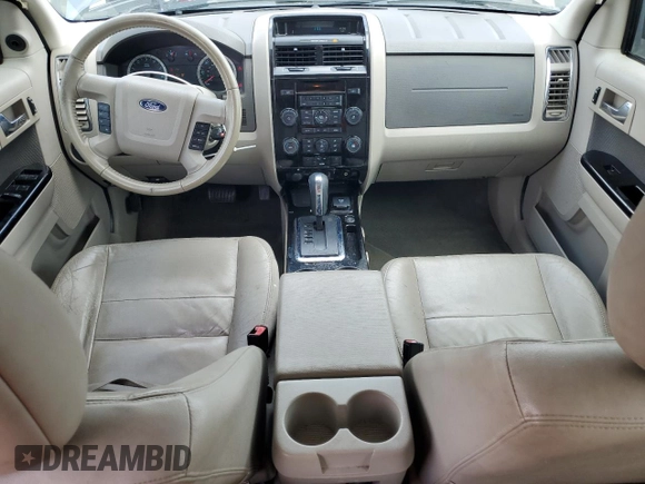 2010 Ford Escape Hybrid with VIN 1FMCU4K30AKC51022, listed as a Copart auction lot 51014615 with 128,275 mi miles and Salvage title. Bid and sale history available at DreamBid. Image 8.