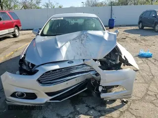 2014 Ford Fusion Titanium with VIN 3FA6P0K90ER228580, listed as a Copart auction lot 49986585 with Not Provided miles and Salvage Title. Bid and sale history available at DreamBid. Image 11.