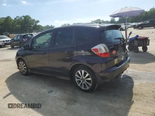2013 Honda Fit Sport with VIN JHMGE8H57DC004712, listed as a Copart auction lot 51426885 with 203,217 mi miles and Salvage Title. Bid and sale history available at carsss.com. Image 2.