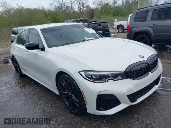 2021 BMW 3 Series M340i with VIN 3MW5U7J01M8B74069, listed as a IAAI auction lot 41879940 with 61,721 mi miles. Bid and sale history available at carsss.com. Image 1.