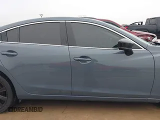 2021 Mazda 6 Carbon Edition with VIN JM1GL1WY0M1600414, listed as a IAAI auction lot 41551393 with 36,780 mi miles and . Bid and sale history available at DreamBid. Image 13.