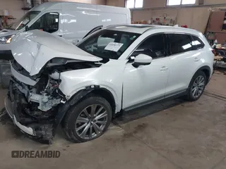 2021 Mazda CX-9 Signature with VIN JM3TCBEY3M0509978, listed as a IAAI auction lot 41690773 with 65,418 mi miles. Bid and sale history available at carsss.com. Image 2.