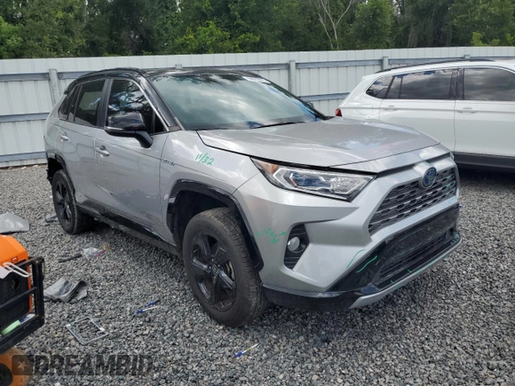 2021 Toyota RAV4 Hybrid XSE with VIN 2T3E6RFVXMW020561, listed as a Copart auction lot 64822005 with 39,434 mi miles and Salvage title. Bid and sale history available at DreamBid. Image 4.