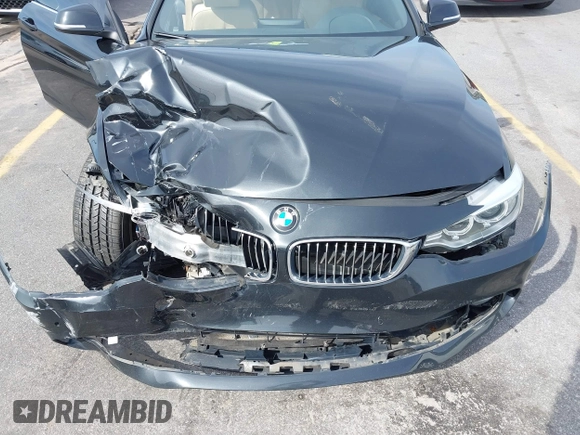 2014 BMW 4 Series 428i with VIN WBA3V5C59EP747773, listed as a IAAI auction lot 41617565 with 65,288 mi miles and . Bid and sale history available at DreamBid. Image 6.