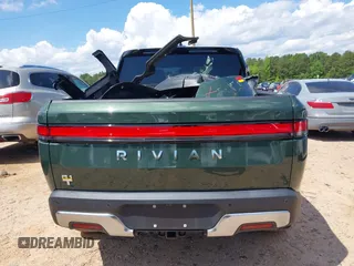 2023 Rivian R1T Adventure z VIN 7FCTGAAAXPN019894, wystawiony jako IAAI lot #42168226 z przebiegiem 23 380 mil mil oraz . Historia ofert i sprzedaży dostępna na DreamBid. Obrazek 17.