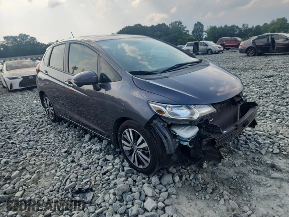 2015 Honda Fit EX-L with VIN 3HGGK5H87FM708737, listed as a Copart auction lot 64310745 with 90,446 mi miles and Salvage title. Bid and sale history available at DreamBid. Image 4.