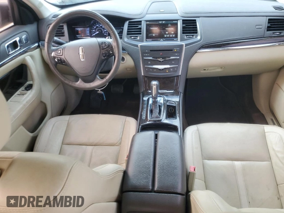 2014 Lincoln MKS with VIN 1LNHL9DKXEG612758, listed as a Copart auction lot 53230065 with 98,863 mi miles and Salvage Title. Bid and sale history available at carsss.com. Image 8.