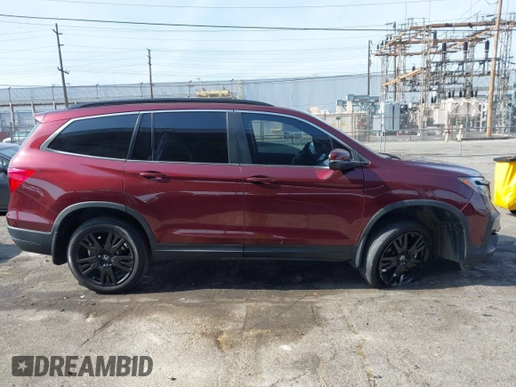 2022 Honda Pilot Special Edition z VIN 5FNYF6H21NB101647, wystawiony jako IAAI lot #42101234 z przebiegiem 32 862 mil mil oraz . Historia ofert i sprzedaży dostępna na DreamBid. Obrazek 13.