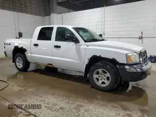 2005 Dodge Dakota SLT z VIN 1D7HW48K15S245809, wystawiony jako Copart lot #76278454 z przebiegiem 213 993 mil mil oraz Czysty tytuł • Clean title. Historia ofert i sprzedaży dostępna na DreamBid. Obrazek 4.