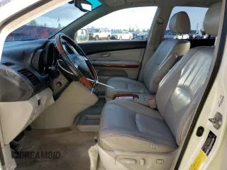 2006 Lexus RX 330 with VIN JTJGA31UX60060839, listed as a Copart auction lot 79948144 with 168,640 mi miles and Salvage Title. Bid and sale history available at DreamBid. Image 7.