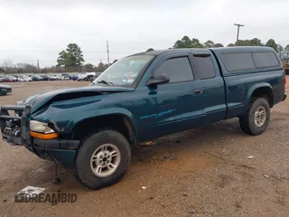1998 Dodge Dakota SLT with VIN 1B7GG22Y9WS723805, listed as a IAAI auction lot 41289779 with 234,324 mi miles. Bid and sale history available at carsss.com. Image 19.