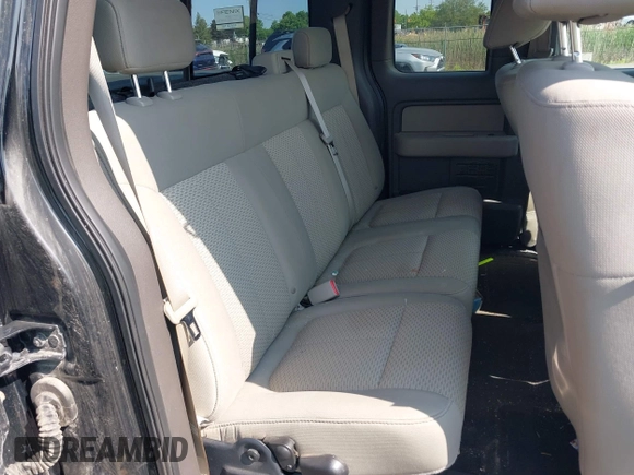 2009 Ford F-150 STX with VIN 1FTRX12859FB10421, listed as a IAAI auction lot 42396272 with 130,864 mi miles and . Bid and sale history available at DreamBid. Image 8.