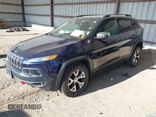 2015 Jeep Cherokee Trailhawk with VIN 1C4PJMBB1FW520649, listed as a IAAI auction lot 41991904 with 168,533 mi miles and . Bid and sale history available at DreamBid. Image 18.