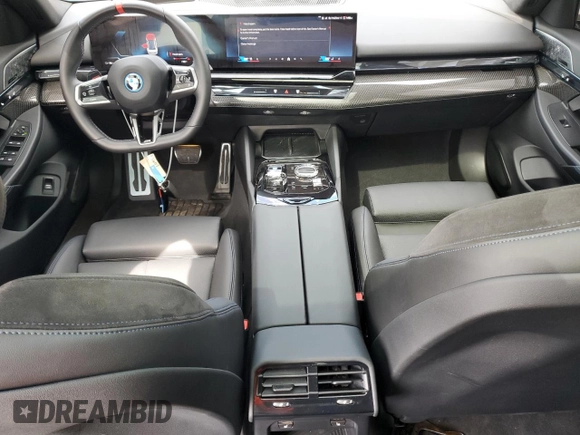 2024 BMW i5 M60 with VIN WBY43FK00RCP86174, listed as a Copart auction lot 45522685 with 7,392 mi miles and Salvage title. Bid and sale history available at DreamBid. Image 8.