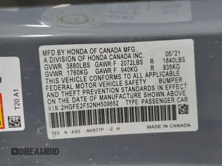 2022 Honda Civic Sport z VIN 2HGFE2F52NH509652, wystawiony jako Copart lot #54934335 z przebiegiem Nie podano mil oraz Szkoda całkowita • Salvage title. Historia ofert i sprzedaży dostępna na DreamBid. Obrazek 12.