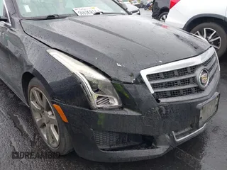 2013 Cadillac ATS z VIN 1G6AA5RA6D0122459, wystawiony jako IAAI lot #41549859 z przebiegiem 144 641 mil mil oraz . Historia ofert i sprzedaży dostępna na DreamBid. Obrazek 6.