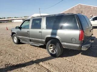 1999 Chevrolet Suburban with VIN 1GNFK16R4XJ483035, listed as a Copart auction lot 76666034 with 215,048 mi miles and Clean Title. Bid and sale history available at carsss.com. Image 2.