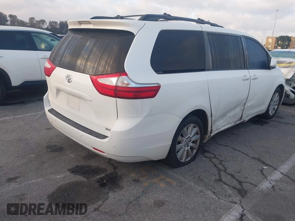 2015 Toyota Sienna Ltd with VIN 5TDDK3DC8FS100841, listed as a IAAI auction lot 41539557 with 219,816 mi miles. Bid and sale history available at carsss.com. Image 4.