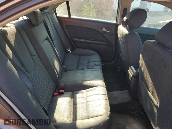 2012 Ford Fusion SE z VIN 3FAHP0HA0CR437115, wystawiony jako Copart lot #56583495 z przebiegiem 159 649 mil mil oraz Szkoda całkowita • Salvage title. Historia ofert i sprzedaży dostępna na DreamBid. Obrazek 10.
