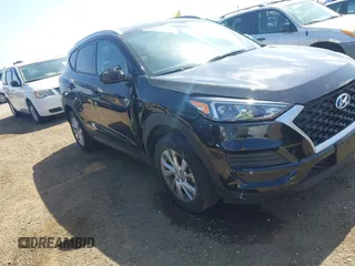 2021 Hyundai Tucson Value with VIN KM8J33A45MU391039, listed as a IAAI auction lot 42086825 with 16,910 mi miles. Bid and sale history available at carsss.com. Image 6.