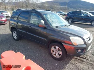2009 Kia Sportage LX with VIN KNDJE723097623239, listed as a IAAI auction lot 41233933 with 169,444 mi miles. Bid and sale history available at carsss.com. Image 1.