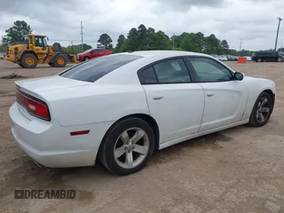 2014 Dodge Charger SE with VIN 2C3CDXBG4EH186881, listed as a IAAI auction lot 41952966 with 206,057 mi miles and . Bid and sale history available at DreamBid. Image 4.