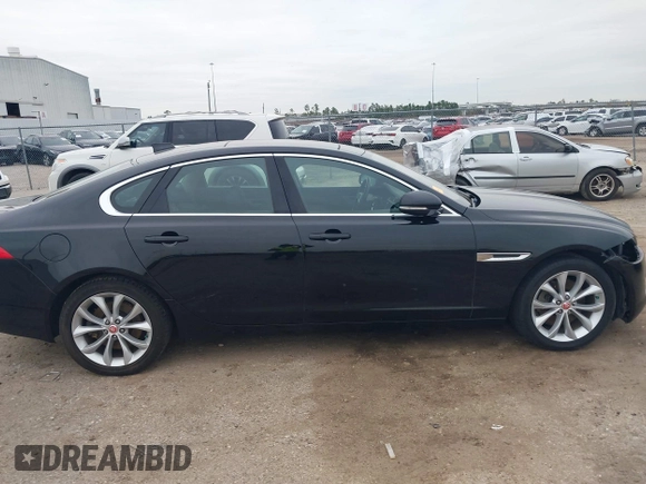 2019 Jaguar XF 25t Premium with VIN SAJBJ4FX5KCY78947, listed as a IAAI auction lot 41261473 with 68,891 mi miles. Bid and sale history available at carsss.com. Image 14.