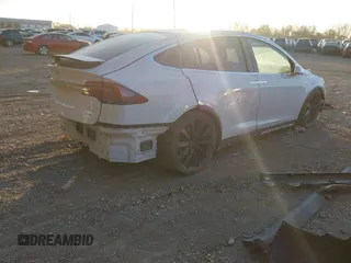 2017 Tesla Model X 90D z VIN 5YJXCBE20HF050017, wystawiony jako IAAI lot #41145641 z przebiegiem Nie podano mil oraz . Historia ofert i sprzedaży dostępna na DreamBid. Obrazek 4.