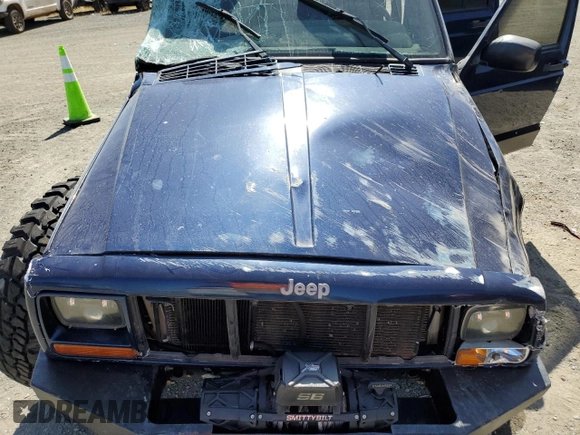 2000 Jeep Cherokee with VIN 1J4FF48S3YL126931, listed as a Copart auction lot 57593305 with Not provided miles and Non repairable. Bid and sale history available at DreamBid. Image 11.