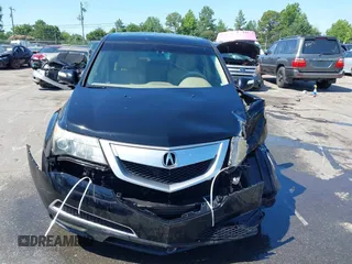 2012 Acura MDX with VIN 2HNYD2H25CH502313, listed as a IAAI auction lot 42542097 with 152,657 mi miles and . Bid and sale history available at DreamBid. Image 12.