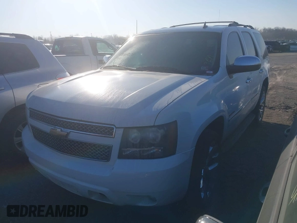2010 Chevrolet Tahoe LTZ with VIN 1GNUKCE01AR197786, listed as a IAAI auction lot 41659828 with 288,151 mi miles and . Bid and sale history available at DreamBid. Image 2.
