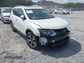 2017 Nissan Rogue SL z VIN 5N1AT2MT0HC868193, wystawiony jako IAAI lot #40285680 z przebiegiem 48 922 mil mil oraz . Historia ofert i sprzedaży dostępna na DreamBid. Obrazek 1.