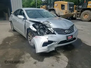 2013 Hyundai Azera с VIN KMHFG4JG5DA204636, выставлен на аукционе Copart как лот 59782945 с пробегом 74 494 миль миль и Списание • Salvage title. История ставок и продаж доступна на DreamBid. Изображение 13.