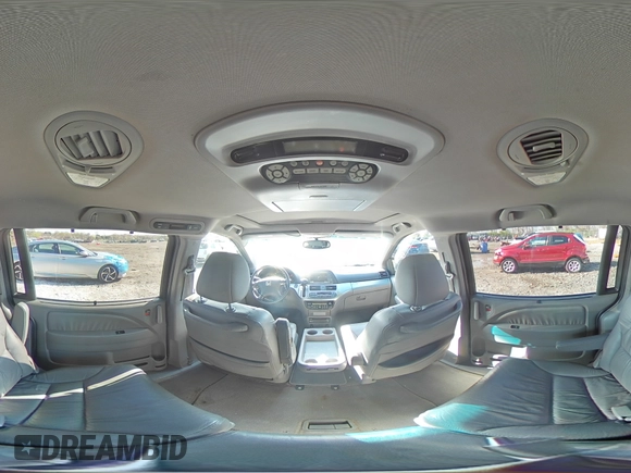 2010 Honda Odyssey EX-L z VIN 5FNRL3H75AB067634, wystawiony jako Copart lot #51538755 z przebiegiem 150 261 mil mil oraz Szkoda całkowita • Salvage title. Historia ofert i sprzedaży dostępna na DreamBid. Obrazek 14.
